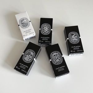 Diptyque 5 perfumes and shopping bag
